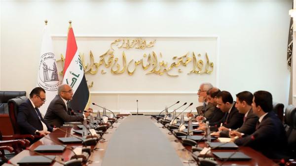 اجتماع حكومي لدعم الدينار العراقي والتصدي لعمليات التلاعب والمضاربة